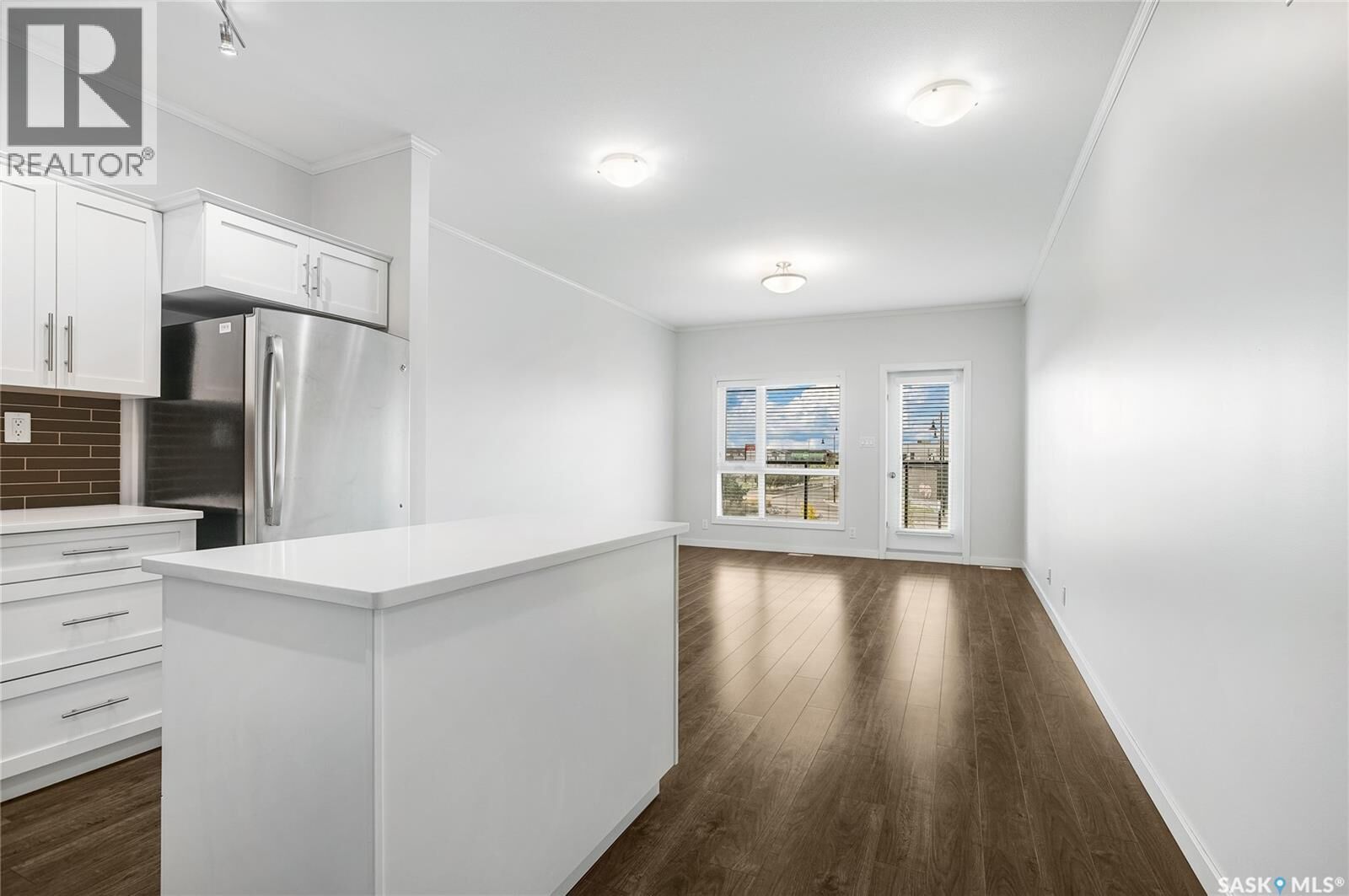 Property Photo:  104 545 Hassard Close  SK S7L 6V3 