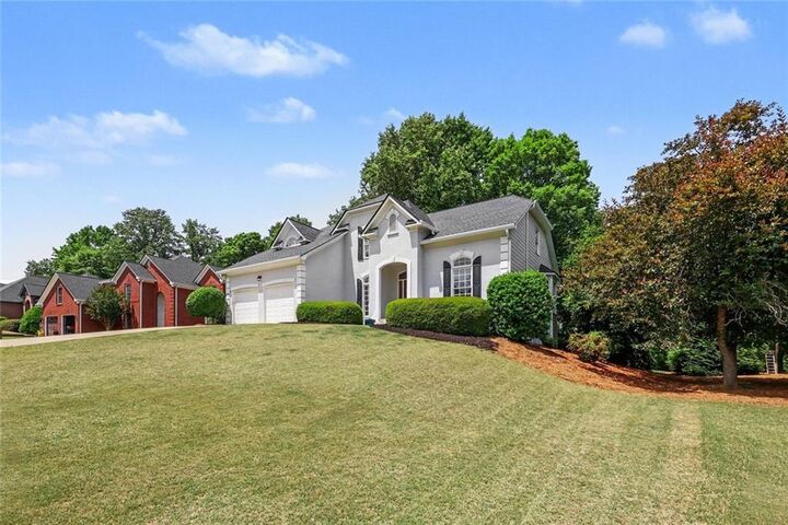 Property Photo:  5640 The 12 Fairway  GA 30024 