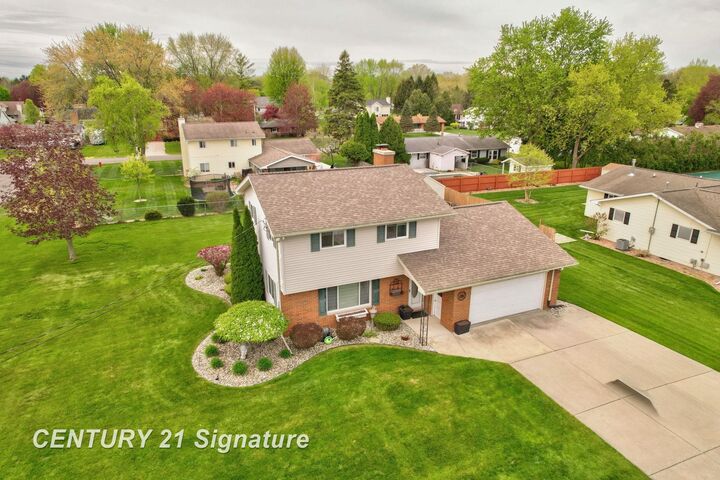 Property Photo:  7165 Burmeister Drive  MI 48609 