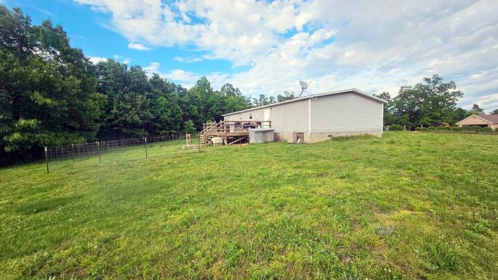Property Photo:  442 Madison 8359  AR 72740 