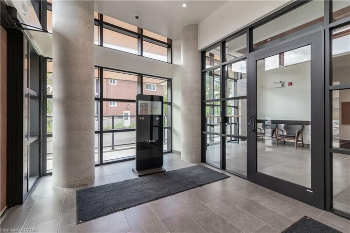 Property Photo:  312 Erb Street W 209  ON N2L 0K9 