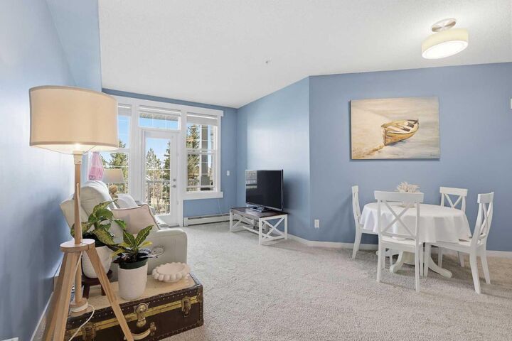 Property Photo:  1 Crystal Green Lane 228  AB T1S 0C5 