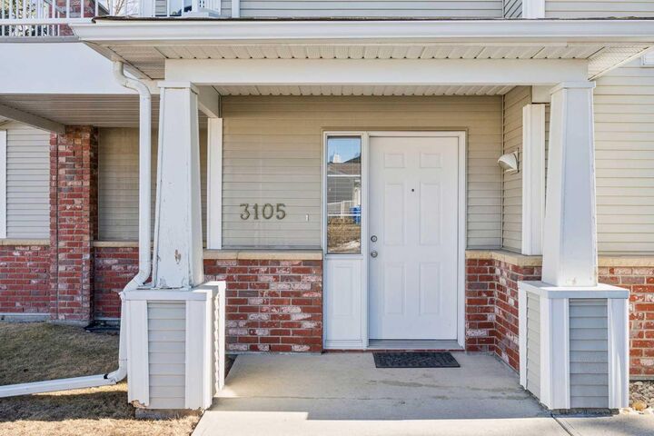 Property Photo:  7171 Coach Hill Road SW 3105  AB T3H 3R7 