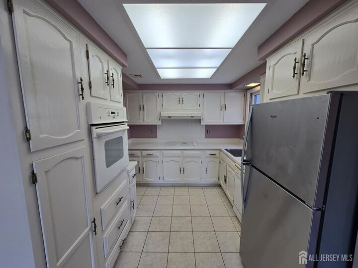 Property Photo: 489 New Haven Way B NJ 08831