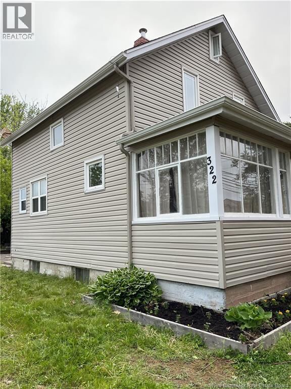 Property Photo:  322 McLaughlin Drive  NB E1A 4R4 