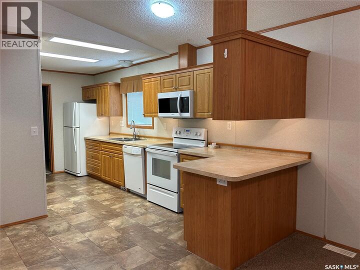 Property Photo:  17 2004 Alice Road  SK S4A 3A7 