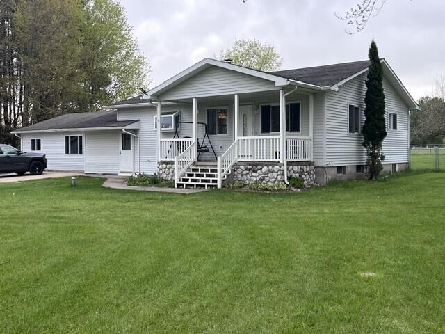 Property Photo:  8671 13 Mile Road  MI 49614 