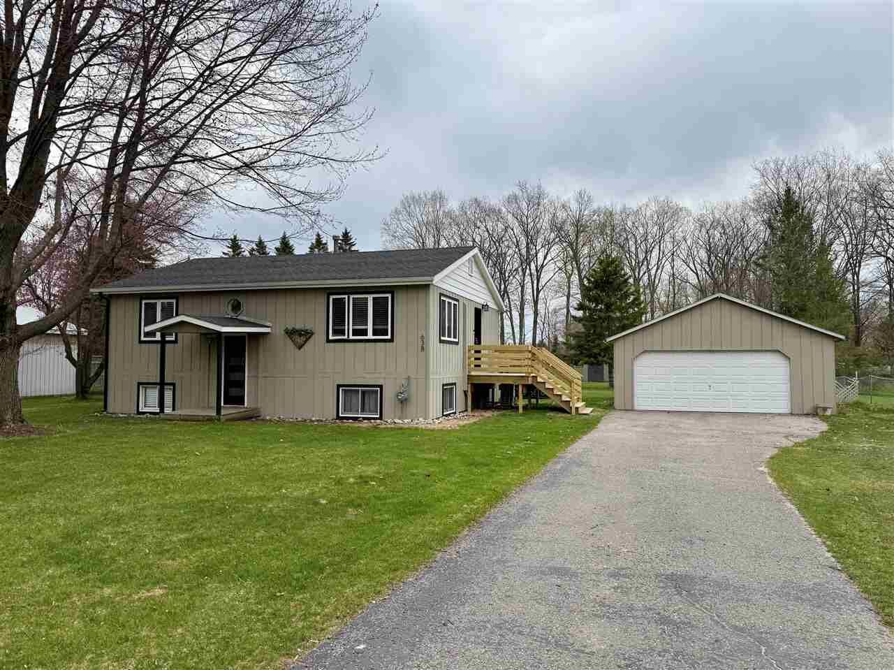 Property Photo:  638 Division  MI 49720 