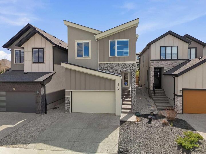 Property Photo:  13 Coulee Crescent SW  AB T3H 6B9 