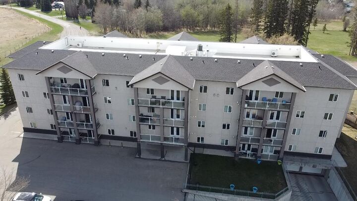 Property Photo:  5205 Woodland Road 207  AB T4G 0B2 