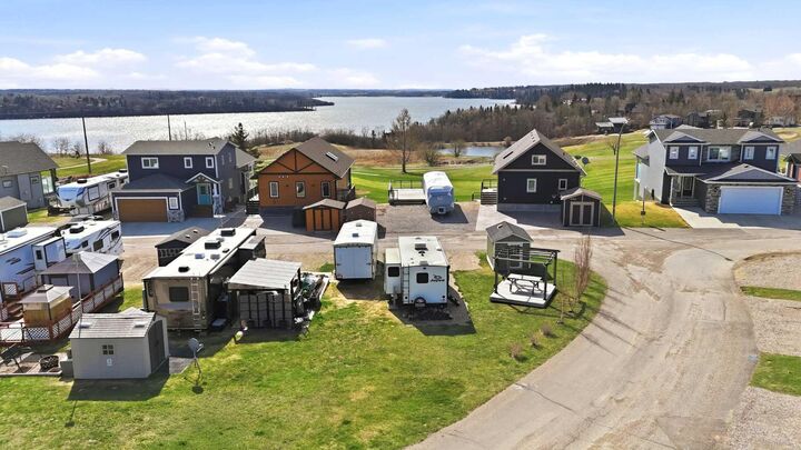 Property Photo:  25054 South Pine Lake Road 6074  AB T0M 1R0 