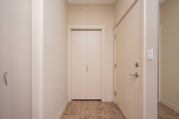 Property Photo:  8710 Horton Road SW 2001  AB T2V 0P7 