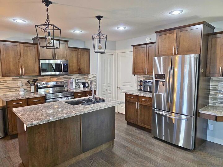 Property Photo:  210 Viscount Drive  AB T4R 0M7 
