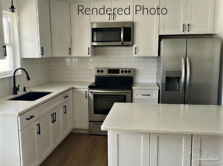 Property Photo:  10598 Kansas Ave  FL 32583 