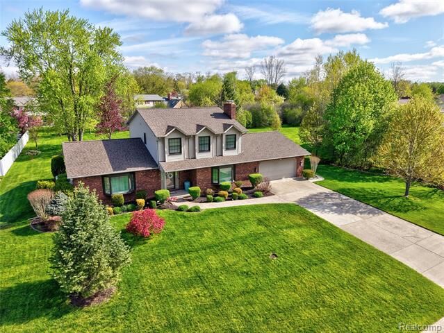 Property Photo:  6338 Covered Wagons Trail  MI 48532 