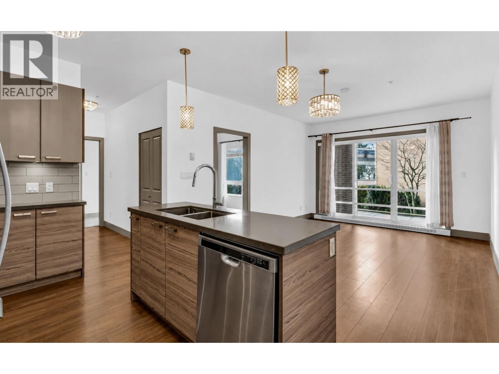 Property Photo:  6875 Dunblane Avenue 103  BC V5J 0G6 