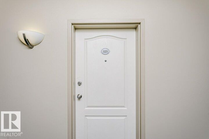 Property Photo:  16807 100 Avenue NW 323  AB T5P 4Z6 