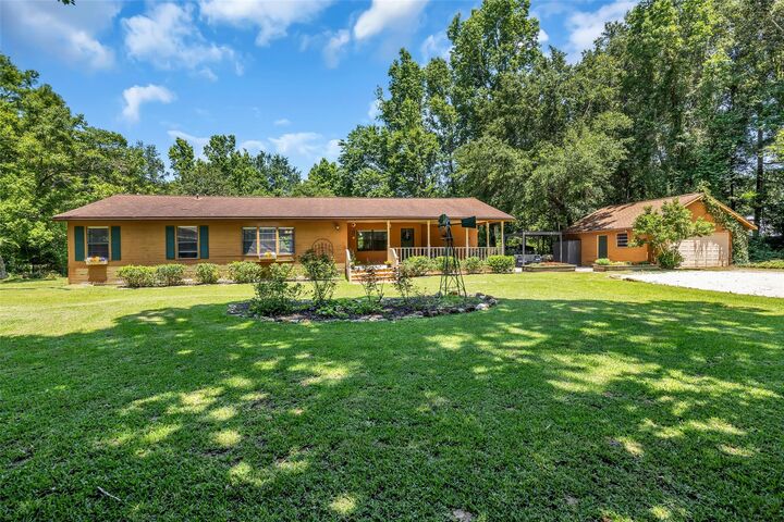 Property Photo: 1439 County Road 318 TX 77327