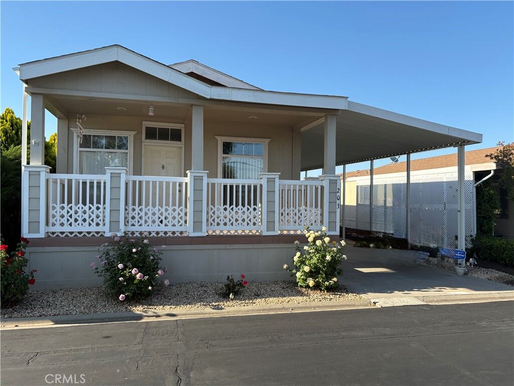 Property Photo:  23820 Ironwood 203  CA 92557 
