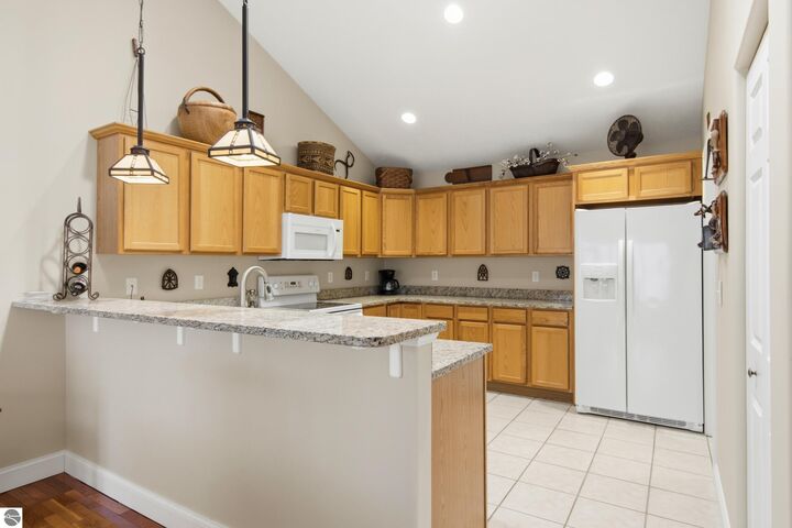 Property Photo:  4911 Black Bear Drive 08  MI 49685 