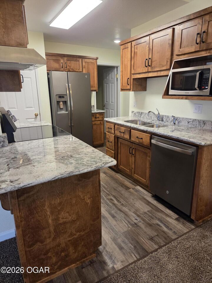 Property Photo:  815 Greenwood Drive  MO 64801 