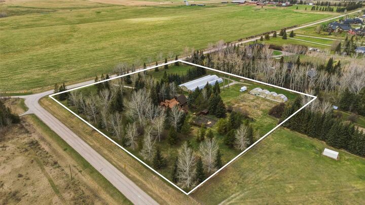 Property Photo:  240074 Range Road 32  AB T3Z 1M3 