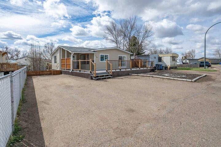 Property Photo: 118 Anson Avenue SW AB T1A 8A3