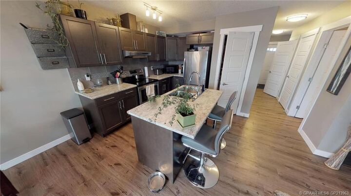Property Photo:  8451 101 Avenue  AB T8X 0R1 