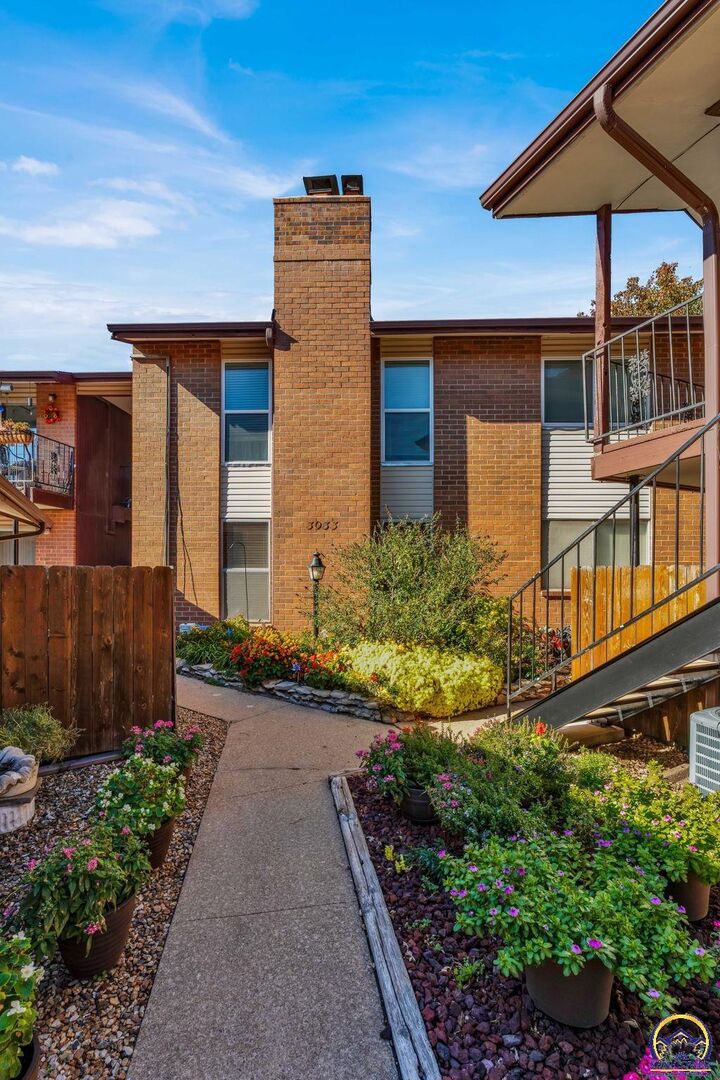 Property Photo:  3033 SW Lydia Ave Unit #107  KS 66614 