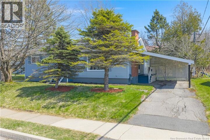 Property Photo:  892 Mollins Drive  NB E2M 4L8 