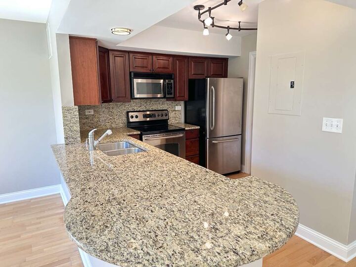 Property Photo:  11 Foxcroft Road 11-127  IL 60565 
