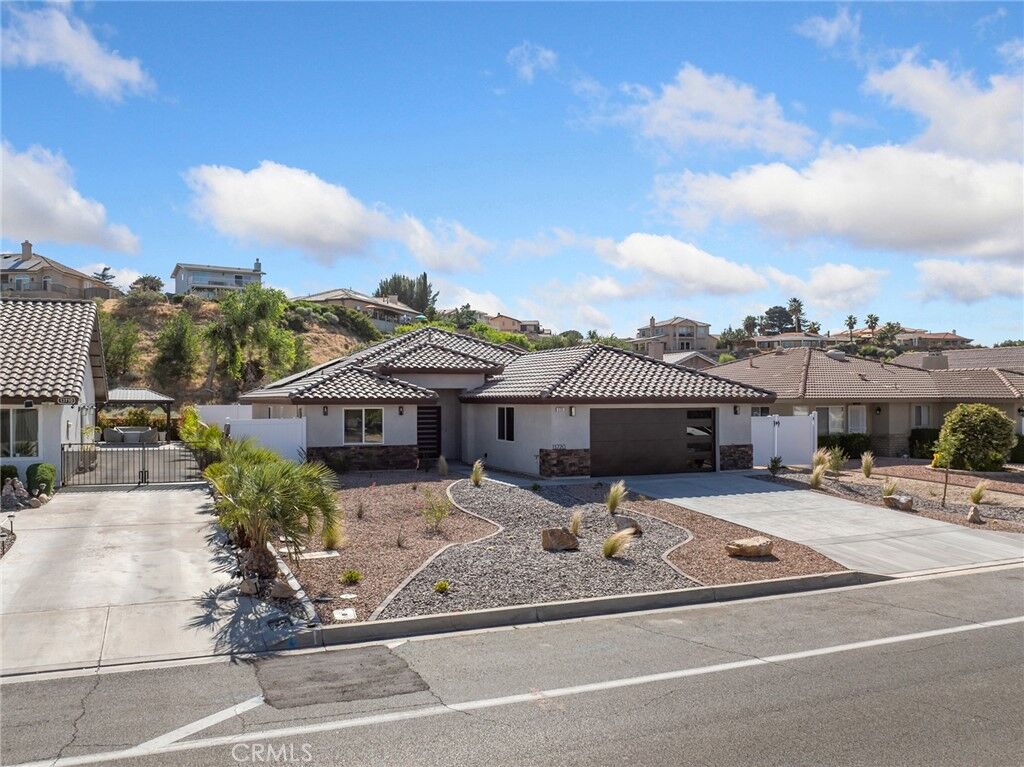 Property Photo:  13720 Spring Valley Parkway  CA 92395 