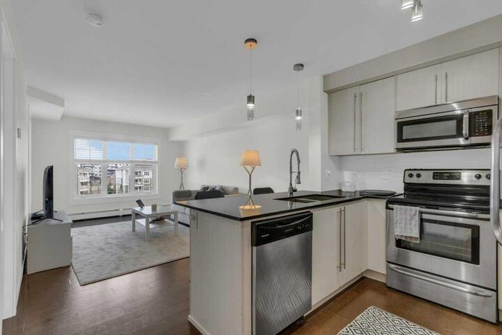 Property Photo:  11 Mahogany Row SE 3411  AB T3M 2L6 