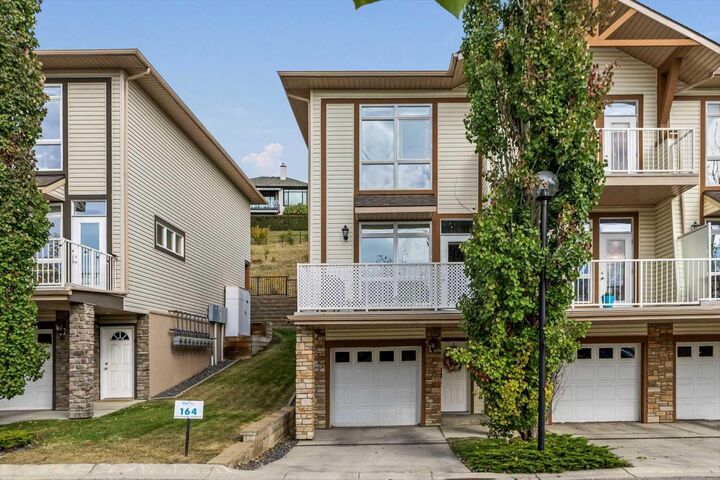 Property Photo:  164 Rockyledge View NW 1  AB T3G 6B2 