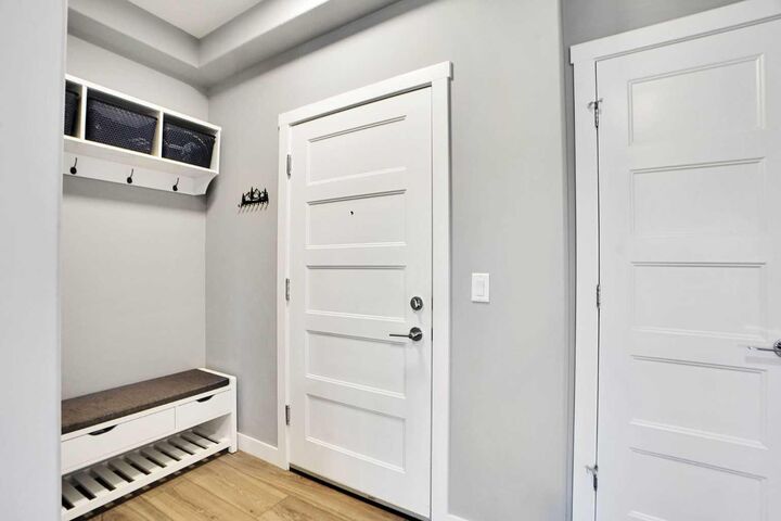 Property Photo:  55 Wolf Hollow Crescent SE 105  AB T2X 5K9 