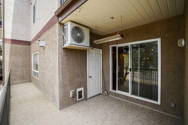 Property Photo: 4834 52A Street 101 AB T4V 1W4