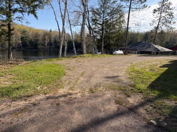 Property Photo:  N8483 Lower Long Lake Drive  WI 54435 