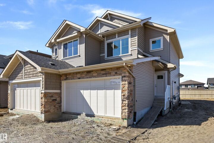 Property Photo:  1044 Cristall Crescent SW  AB T6W 5S6 