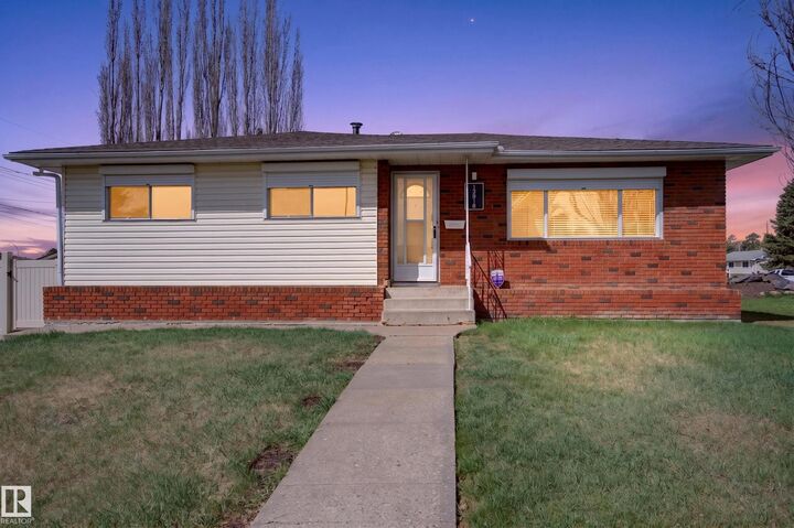 Property Photo:  13916 61 Street NW  AB T5A 1P2 