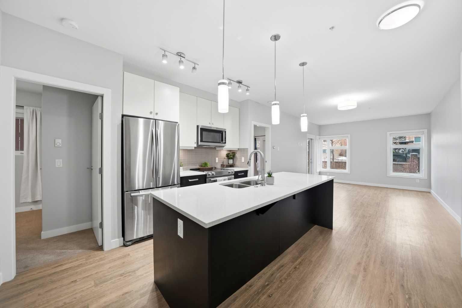 Property Photo:  1720 10 Street SW 107  AB T2T 3E8 