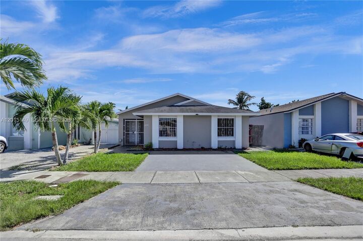 Property Photo:  11854 SW 210th St X  FL 33177 