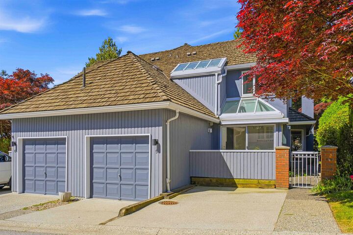 Property Photo: 1925 Indian River Crescent 5 BC V7G 2P7