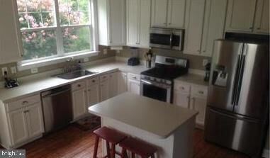 Property Photo: 8213 Glade Bank Drive VA 20111