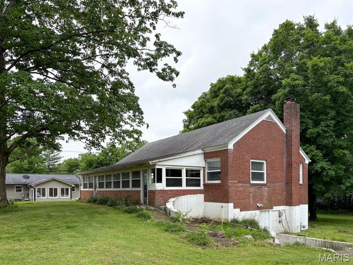 Property Photo: 1224 W Cape Rock Drive MO 63701