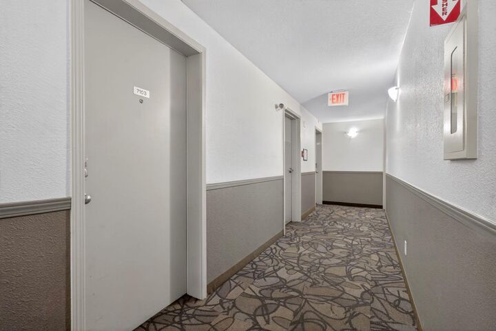 Property Photo:  304 Mackenzie Way SW 7103  AB T4B 3H7 
