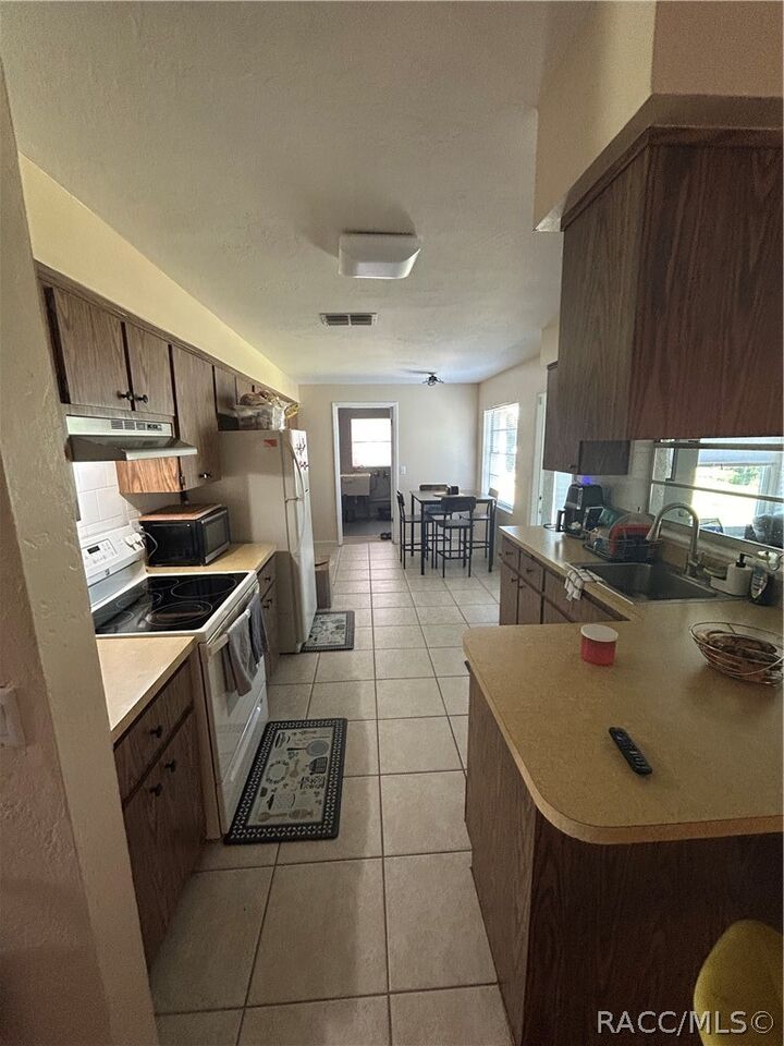 Property Photo:  209 S Tyler Street  FL 34465 