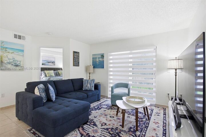 Property Photo:  400 Palm Cir W 102  FL 33025 
