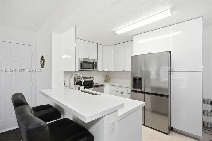 Property Photo:  400 Palm Cir W 102  FL 33025 