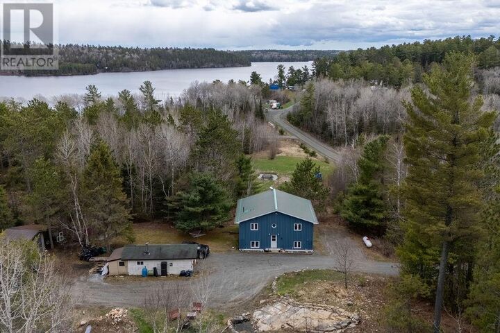 2359 Nepewassi Lake Road — photo 1
