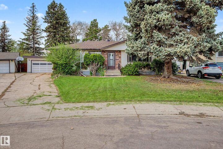 Property Photo:  4728 102A Avenue NW  AB T6A 0R1 